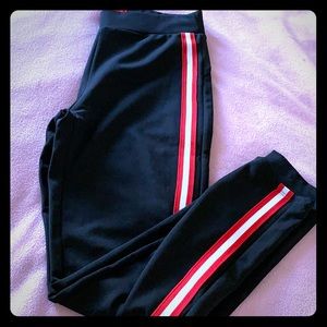 Black with red and white striped track pants